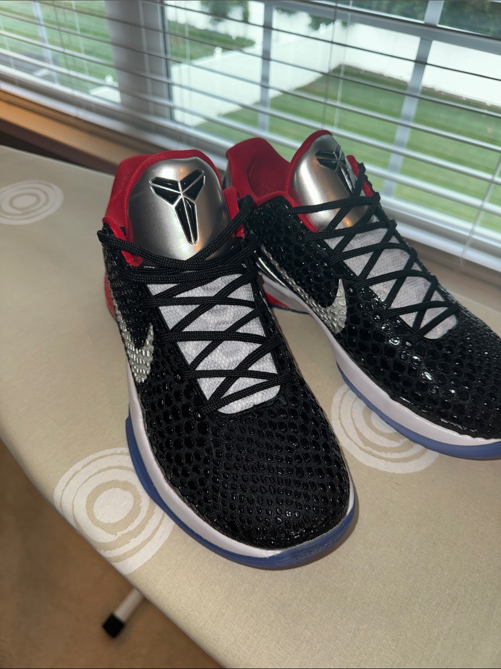 Nike men’s Kobe Black, Red and Silver Low-Top Sneakers